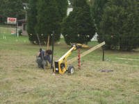 Equine Kingdom - Matt digging a post hole the easy way